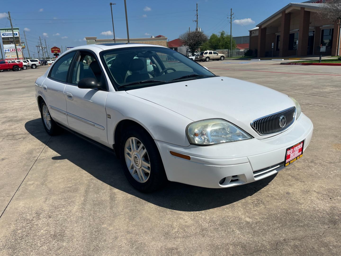 2004 white /TAN Mercury Sable LS Premium (1MEHM55S54A) with an 3.0L V6 SOHC 24V engine, 4-Speed Automatic Overdrive transmission, located at 14700 Tomball Parkway 249, Houston, TX, 77086, (281) 444-2200, 29.928619, -95.504074 - Photo#0